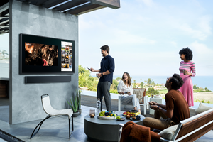 Samsang outdoor TV with sound bar and speaker system.